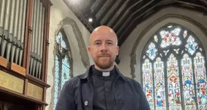 Ex-wrestler swaps combat for priesthood